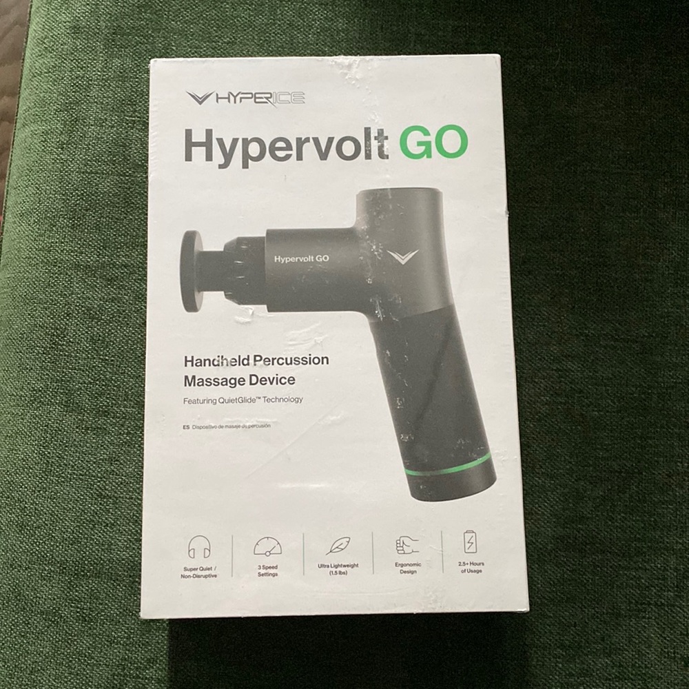 HyperIce Hypervolt Go. Handheld percussion massage device, like a Theragun